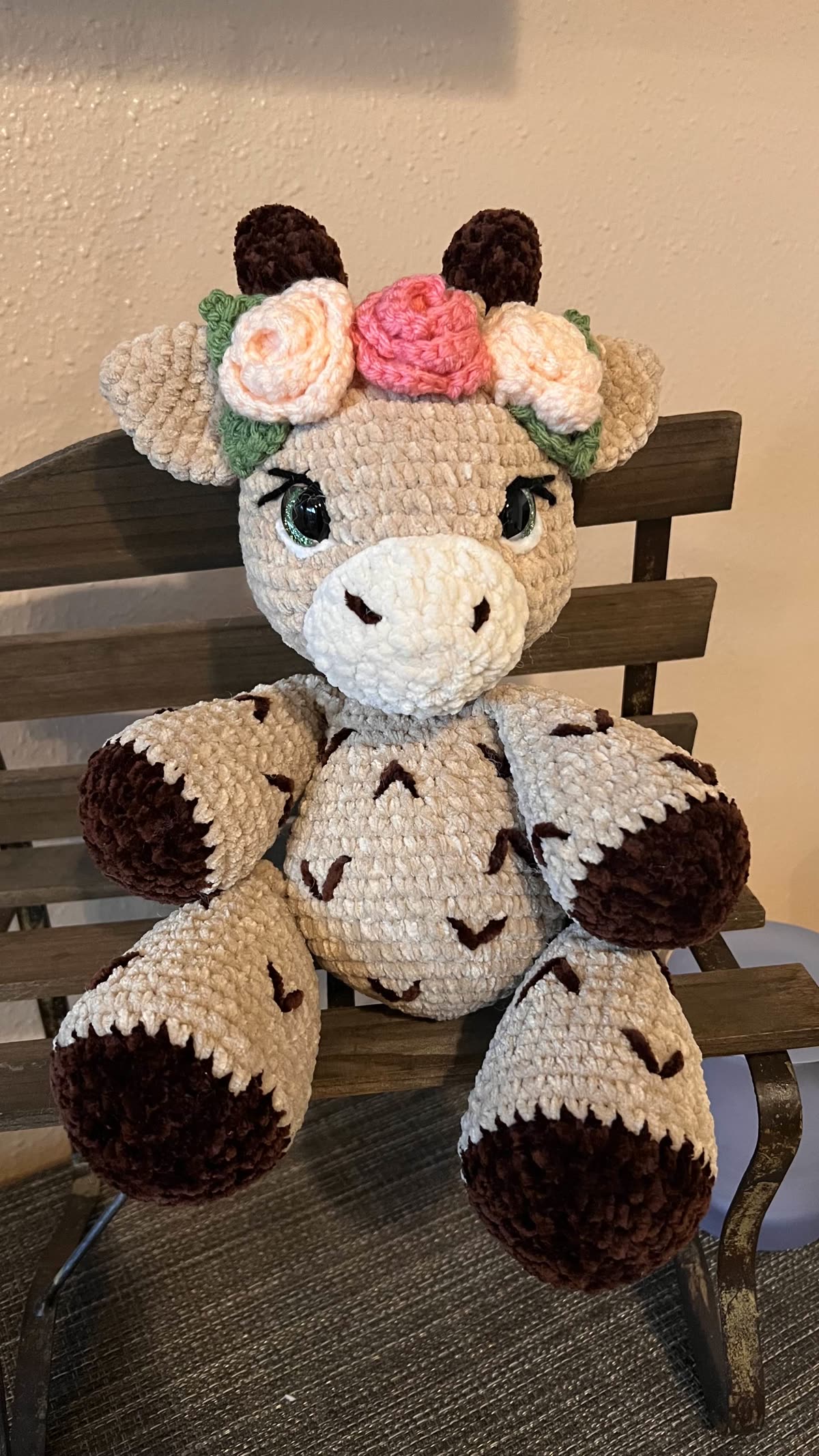 Handmade crochet giraffe plushie with a flower crown